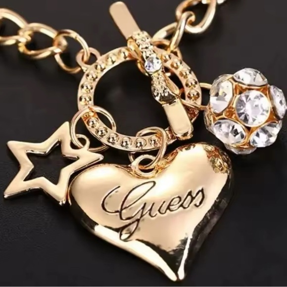 Guess Charm Bracelet gold Heart & Star Accents Toggle Closure - Picture 1 of 7
